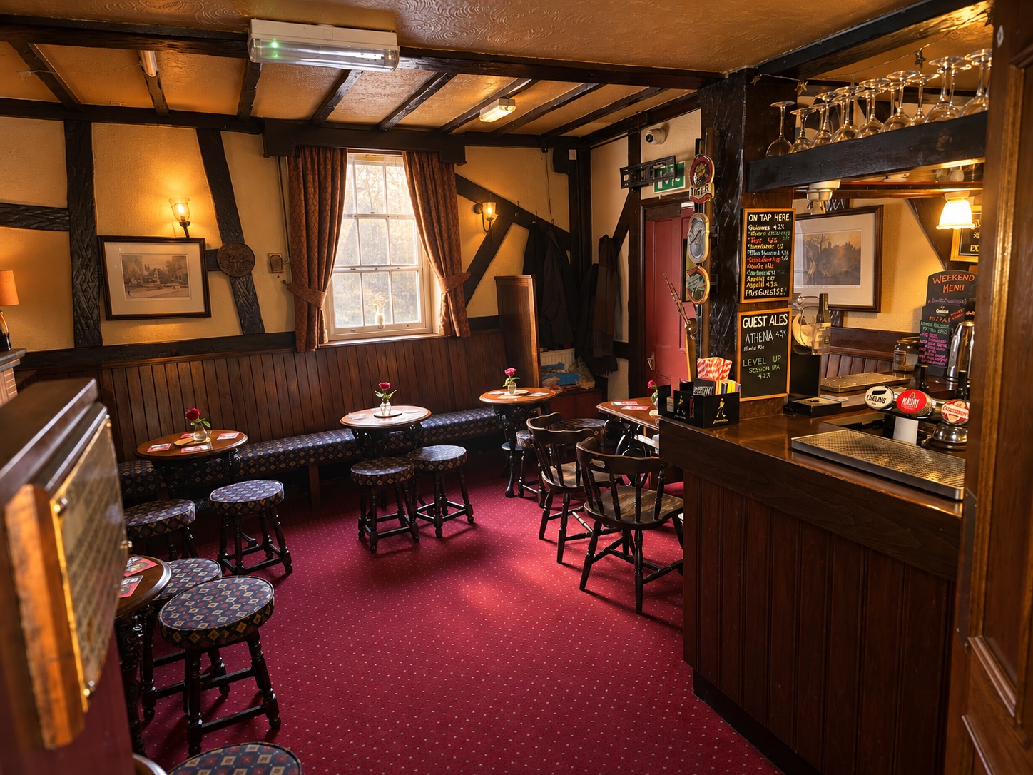 The traditional snug with wooden beams and cosy corner seating